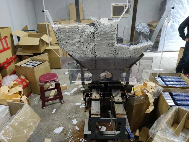 海巡查獲私菸工廠 抓6人起獲逾1.8萬包菸