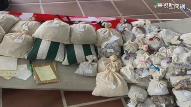 ｢愛心太重｣ 27萬元硬幣善款壓垮鐵桌