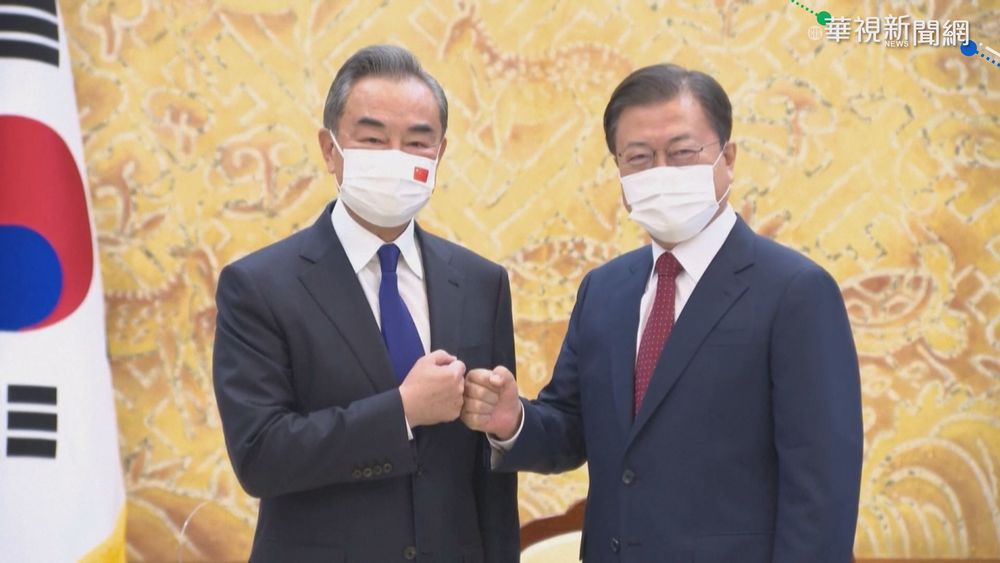王毅訪南韓會文在寅 促兩韓恢復對話
