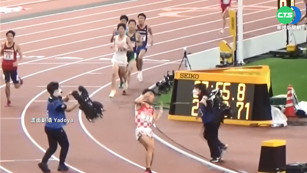 扯! 攝影師誤入長跑賽 選手遭電線勒頸