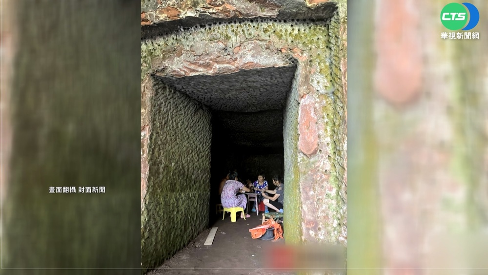 中國南部飆破40度 民眾躲古墓洞穴避暑