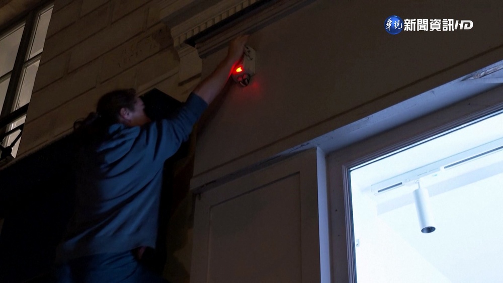 搶救能源危機 法"跑酷"好手關商店招牌燈