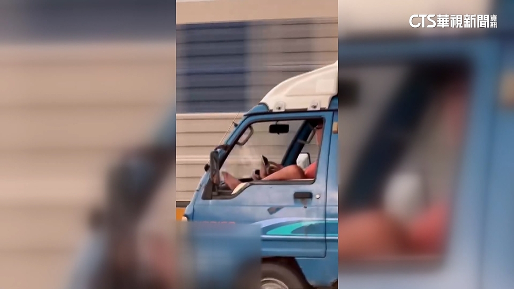 扯！　國道貨車駕駛腳「放」窗上　邊滑手機邊開車