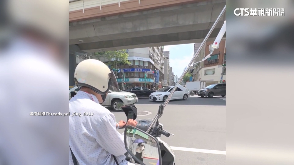 險！　騎士「邊吊點滴邊騎車」　竟只是為了「買飲料」